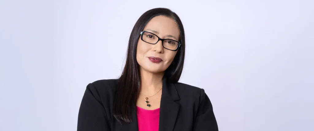 Professional headshot of Janelle Rollo, Summit Conflict Resolution mediator, smiling for family law mediation.